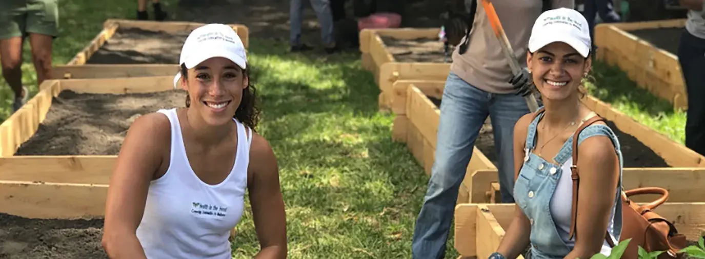 Image: two women working in a garden. Title: What is the Circular Economy?